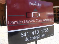 Damien Daniels Construction sign at jobsite 